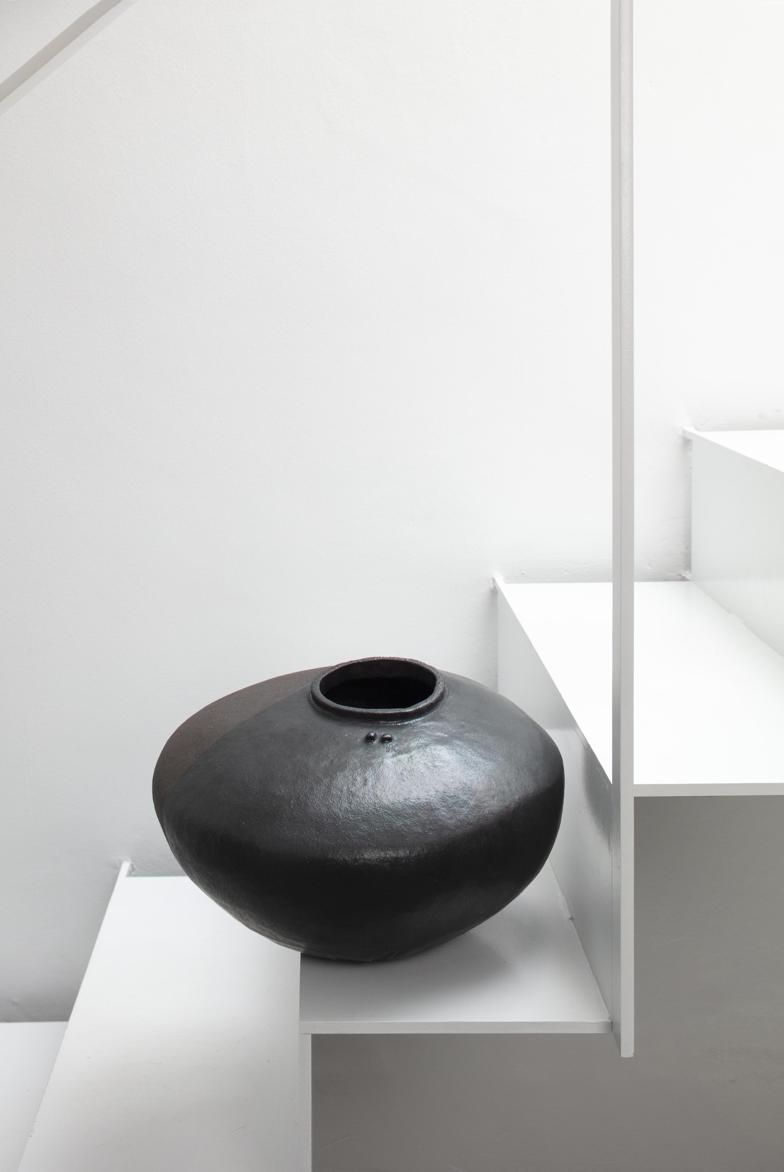 Boris Zbikowski, No 25 13, 2025, tall black ceramic vessel from Half of the Truth series 