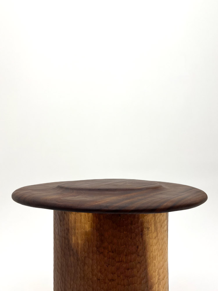 Detail of Cowboy Table by Camille Tan, showing the table top, made of solid teak wood 