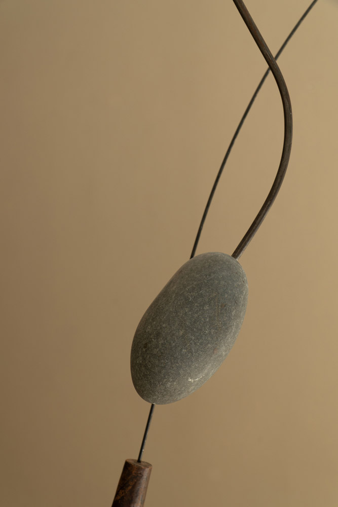 Close up of Suspension #26 El Caballero by Camille Tan showing granite 