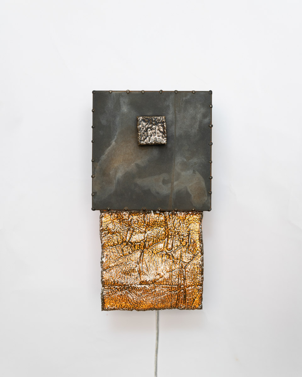 Oxidised Light by Hanna Fastrich, 2026, porcelain, glaze, blackened stainless steel, light 